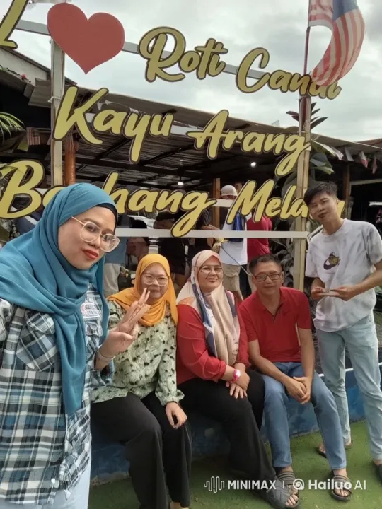 Martial Arts Display in Front of 'I Love Roti Canai' Sign – AI Generated Video | Hailuo AI
