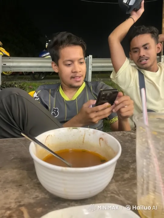 Nighttime Kung Fu Display by Boy at Outdoor Table – AI Generated Video | Hailuo AI
