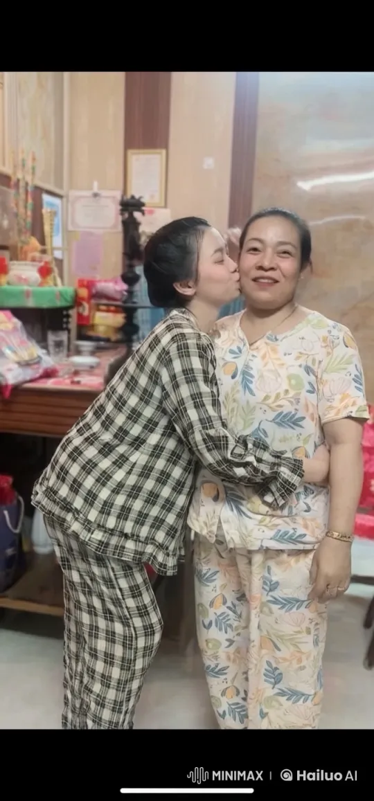 Affectionate Moment Between Two Women in Pajamas – AI Generated Video | Hailuo AI