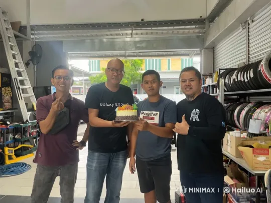Garage Celebration: Men Share Birthday Joy in Auto Shop – AI Generated Video | Hailuo AI