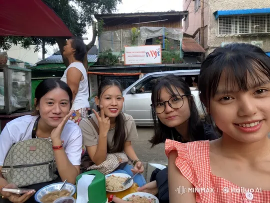 Group Engages in Playful Fighting at Outdoor Food Stall – AI Generated Video | Hailuo AI