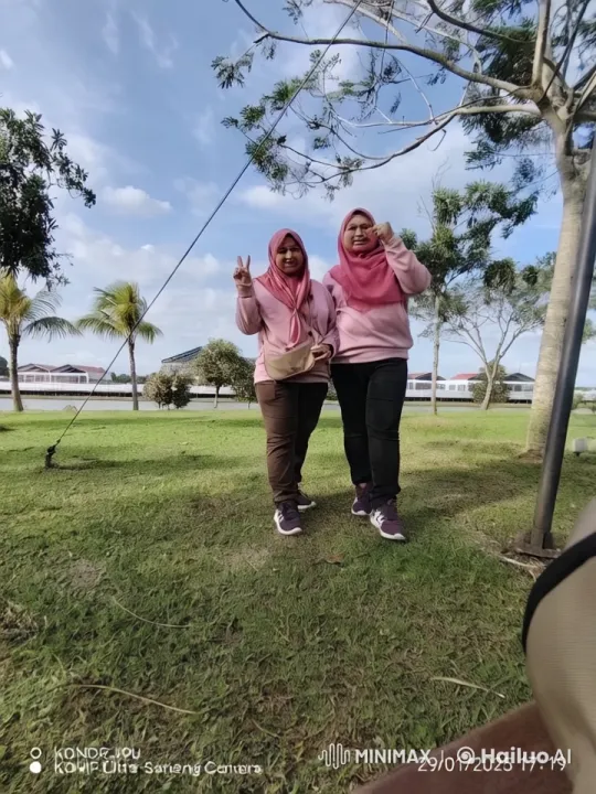 Two Women Perform Energetic Kungfu on a Grass Field – AI Generated Video | Hailuo AI