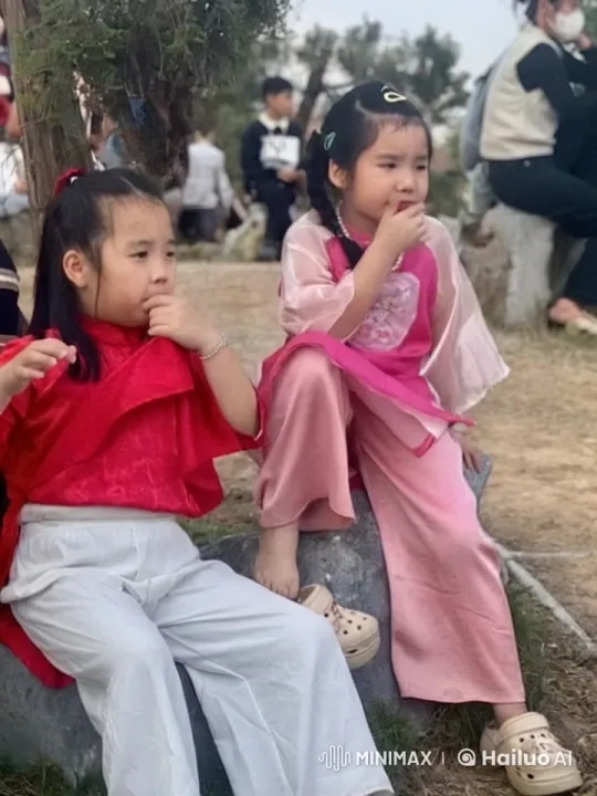 Girls in Traditional Attire Display Playful Kung Fu Skills – AI Generated Video | Hailuo AI
