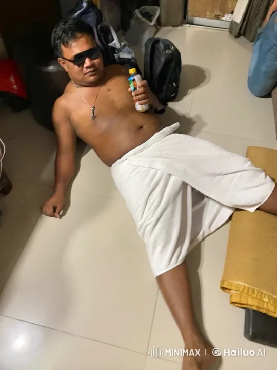 Man Rests on Floor, Observes Room with Minimal Movement – AI Generated Video | Hailuo AI