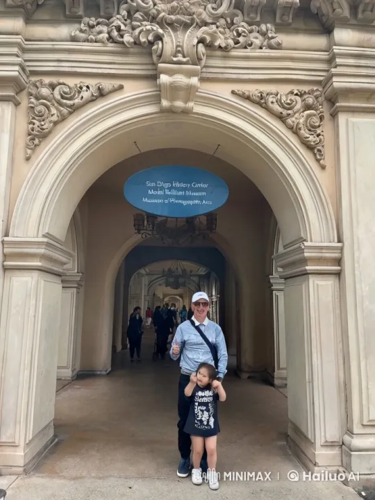 Playful Tussle Under San Diego Archway – AI Generated Video | Hailuo AI