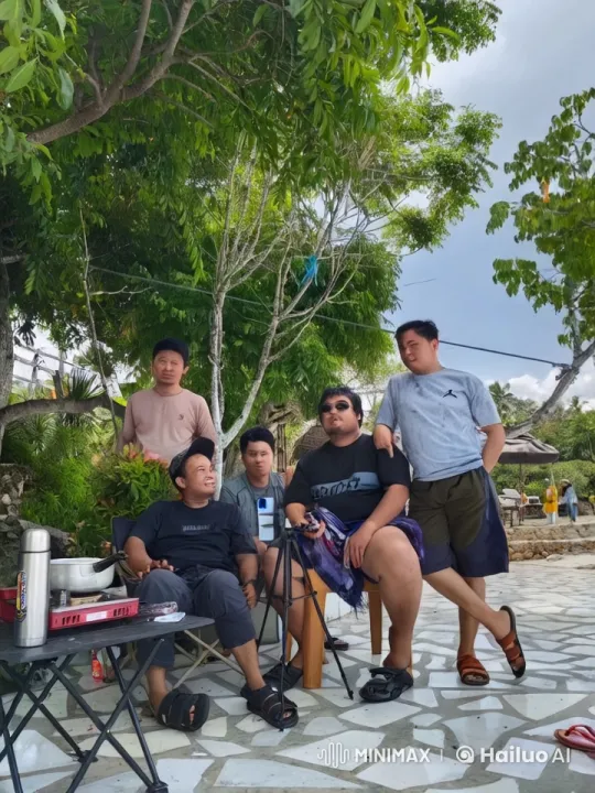 Friends Enjoy Playful Kungfu Fight in Lush Patio – AI Generated Video | Hailuo AI