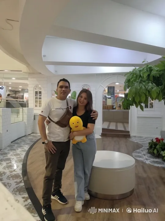 Couple Performs Synchronized Martial Arts in Mall Atrium – AI Generated Video | Hailuo AI