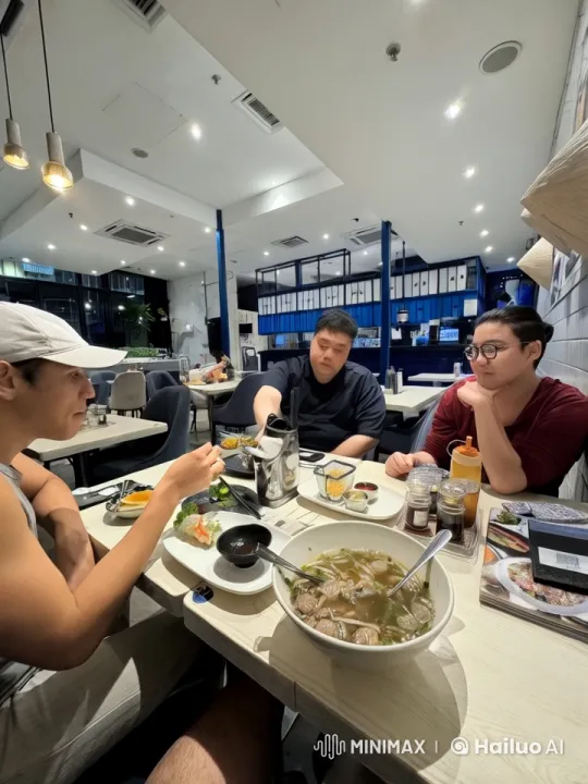 Friends Enjoy Meal and Impromptu Kung Fu in Modern Restaurant – AI Generated Video | Hailuo AI