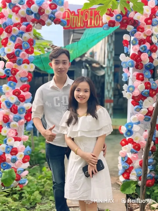 Couple's Intense Martial Arts Display in Colorful Garden Setting – AI Generated Video | Hailuo AI