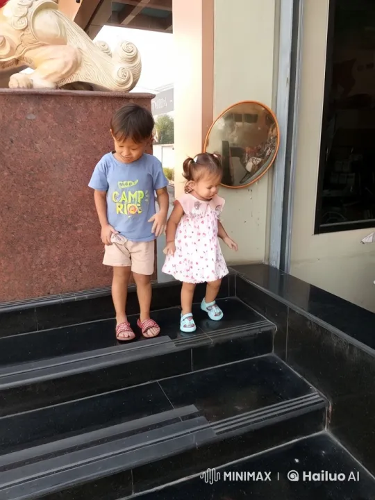 Children Playfully Enact Kung Fu Fight on Steps – AI Generated Video | Hailuo AI