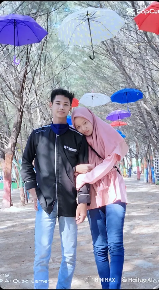 Couple Transforms into Martial Artists in Colorful Umbrella Forest – AI Generated Video | Hailuo AI