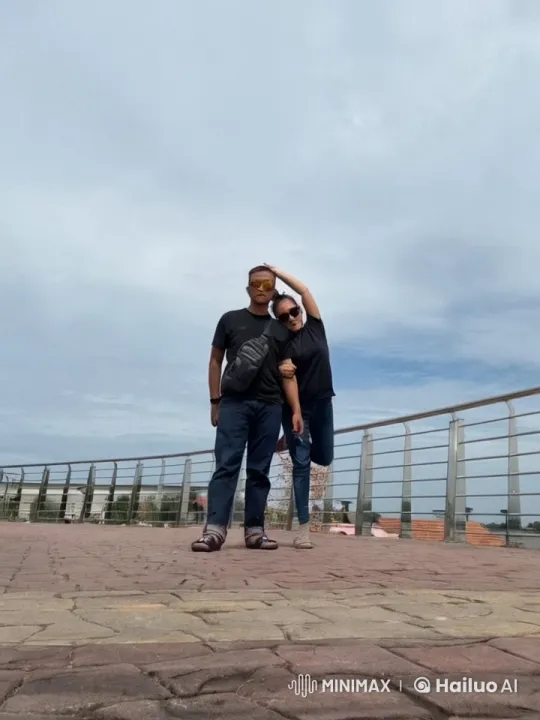 Martial Arts Duo Performs Dynamic Sparring on Walkway – AI Generated Video | Hailuo AI