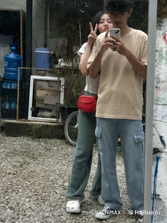 Young Couple's Energetic Kung Fu Fight in Reflective Setting – AI Generated Video | Hailuo AI