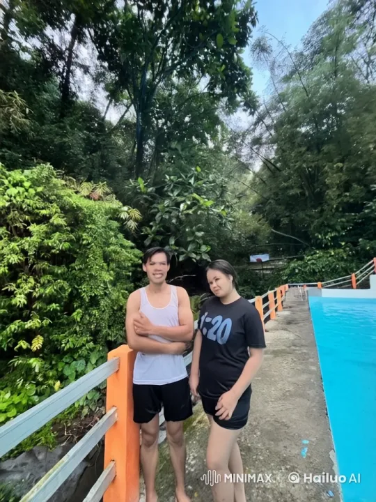 Couple Demonstrates Impressive Kung Fu by Swimming Pool – AI Generated Video | Hailuo AI