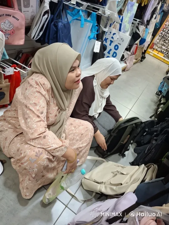 Woman Examines Backpacks in a Busy Retail Store – AI Generated Video | Hailuo AI