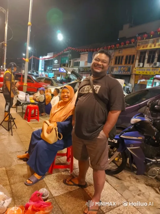 Night Market: Silat Demonstration Amidst Bustling Scene – AI Generated Video | Hailuo AI