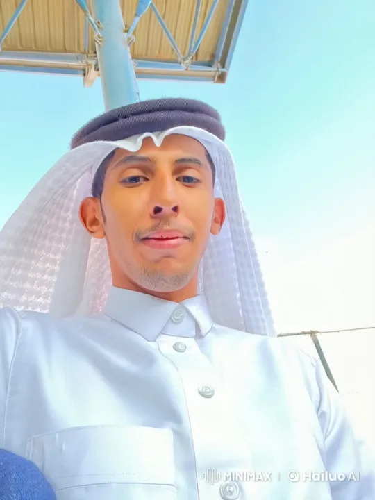 Traditional Attire, Smoking Under Blue Sky – AI Generated Video | Hailuo AI