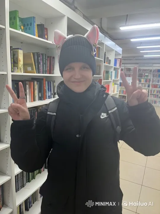 Person-to-Cat Transformation in Brightly-Lit Library – AI Generated Video | Hailuo AI