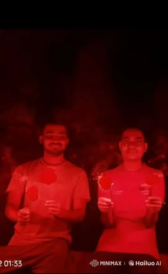Intimate Moment Illuminated by Sparklers in Dark Ambiance – AI Generated Video | Hailuo AI