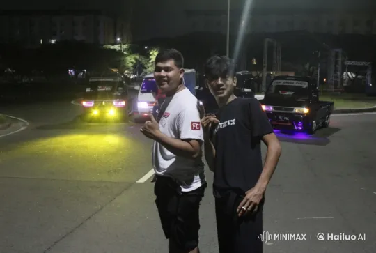 Nighttime Street Scene with Modified Cars and Young Men – AI Generated Video | Hailuo AI