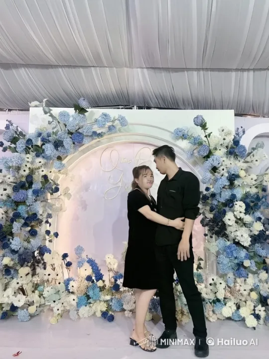 Couple Performs Skilled Kungfu Amidst Elegant Floral Setting – AI Generated Video | Hailuo AI