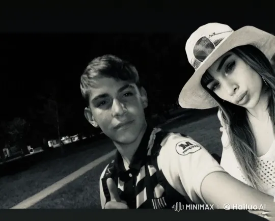 Affectionate Moment Between a Boy and Girl in a Park at Night – AI Generated Video | Hailuo AI