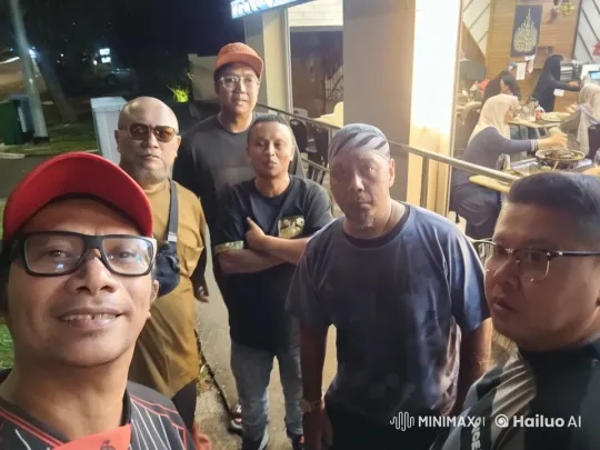 Nighttime Kungfu Display Outside Bright Restaurant – AI Generated Video | Hailuo AI