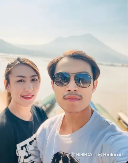 Two Friends Playfully Spar in Serene Mountain Setting – AI Generated Video | Hailuo AI