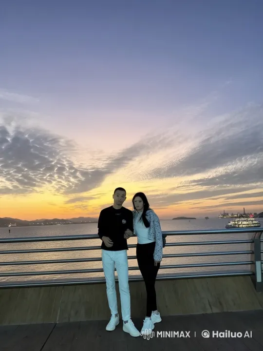 Couple Performs Dynamic Kungfu on Sunset Boardwalk – AI Generated Video | Hailuo AI