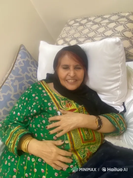 Elderly Woman Reflects in Comfortable Bedroom with Cigarette – AI Generated Video | Hailuo AI