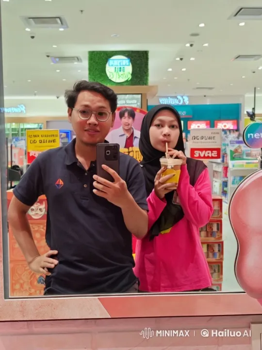 Mall Mirror Kung Fu Fight: Hijab-Wearing Woman vs. Navy Polo Man – AI Generated Video | Hailuo AI