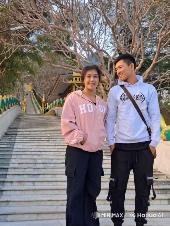 Athletic Couple Practices Kung Fu on Grand Staircase – AI Generated Video | Hailuo AI