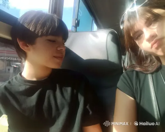 Calm Bus Ride: A Moment Shared Between Two People – AI Generated Video | Hailuo AI