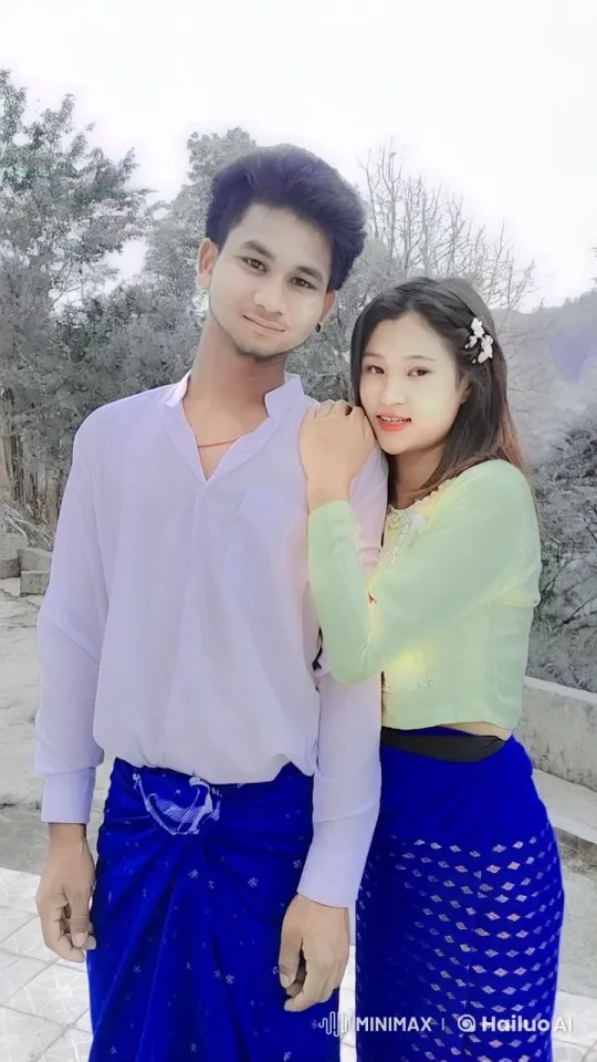 Young Couple in Traditional Attire Embrace Outdoors – AI Generated Video | Hailuo AI