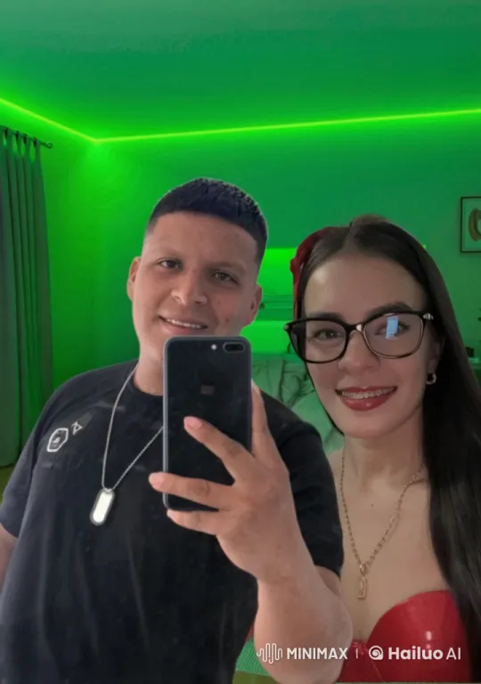 Intimate Moment Captured in Modern, Green-Lit Room – AI Generated Video | Hailuo AI