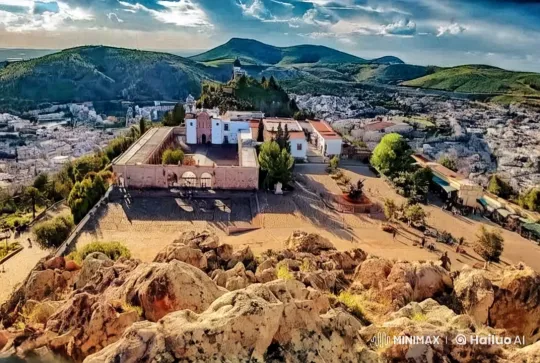 Sunset Over Historic Buildings and Lush Hills – AI Generated Video | Hailuo AI