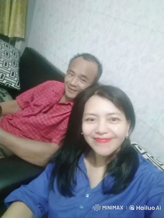 Couple Engages in Playful Fight on Sofa – AI Generated Video | Hailuo AI