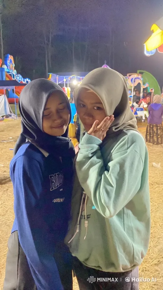 Hijab-Wearing Women Spar at Lively Carnival Night – AI Generated Video | Hailuo AI