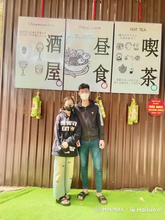 Kungfu Duo Perform in Front of Asian-Themed Menu Signs – AI Generated Video | Hailuo AI