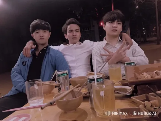 Friends Enjoying Kungfu Fun at a Restaurant Table – AI Generated Video | Hailuo AI