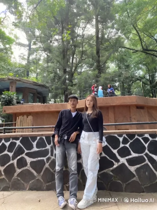 Casual Duo Performs Energetic Kungfu Against Serene Background – AI Generated Video | Hailuo AI