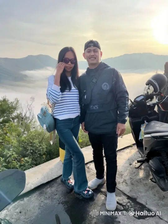 Couple Demonstrates Martial Arts on Mountain Overlook – AI Generated Video | Hailuo AI