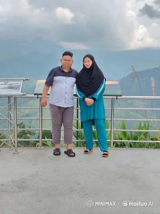 Couple Practicing Synchronized Kung Fu on Mountain Deck – AI Generated Video | Hailuo AI