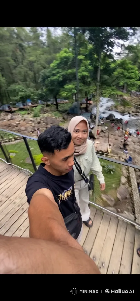 Kung Fu Fight on Wooden Bridge with Waterfall Background – AI Generated Video | Hailuo AI