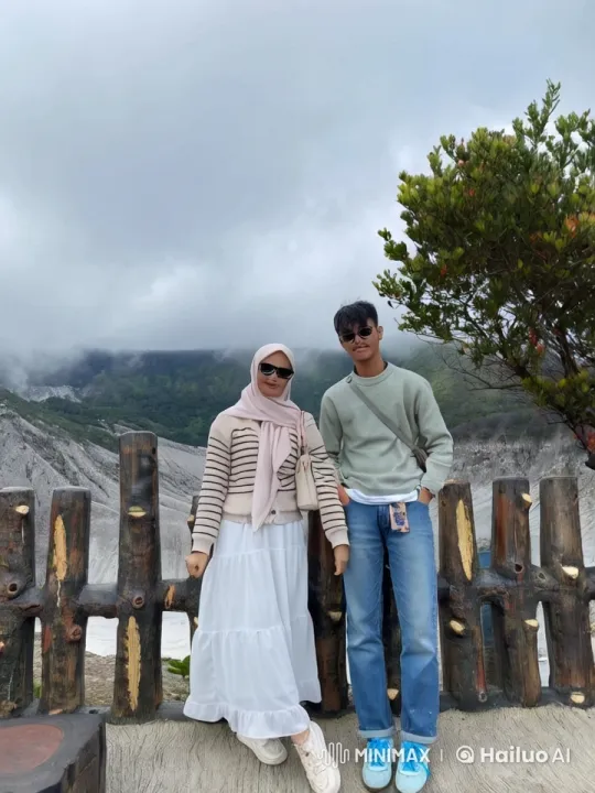 Young Woman and Man Perform Kungfu Against Mountains – AI Generated Video | Hailuo AI