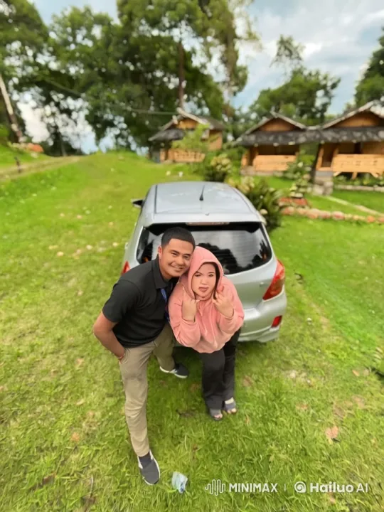 Playful Kungfu Fight Near Silver Car and Wooden Cabins – AI Generated Video | Hailuo AI