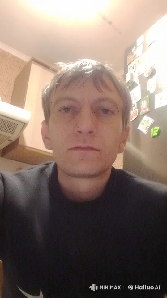 Disappointed Man Reflects in Dimly Lit Kitchen – AI Generated Video | Hailuo AI