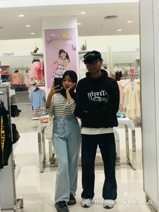 Couple Performs Kungfu Poses in Clothing Store – AI Generated Video | Hailuo AI
