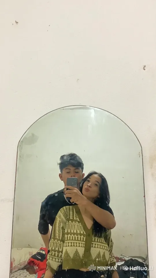 Young Couple Shadowboxing in Dimly Lit Room – AI Generated Video | Hailuo AI