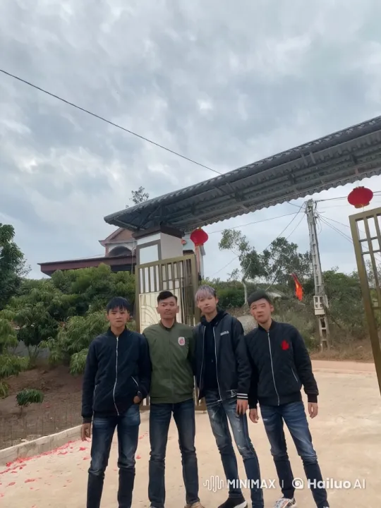Young Men Practicing Martial Arts in Front of Lantern-Decorated Gate – AI Generated Video | Hailuo AI